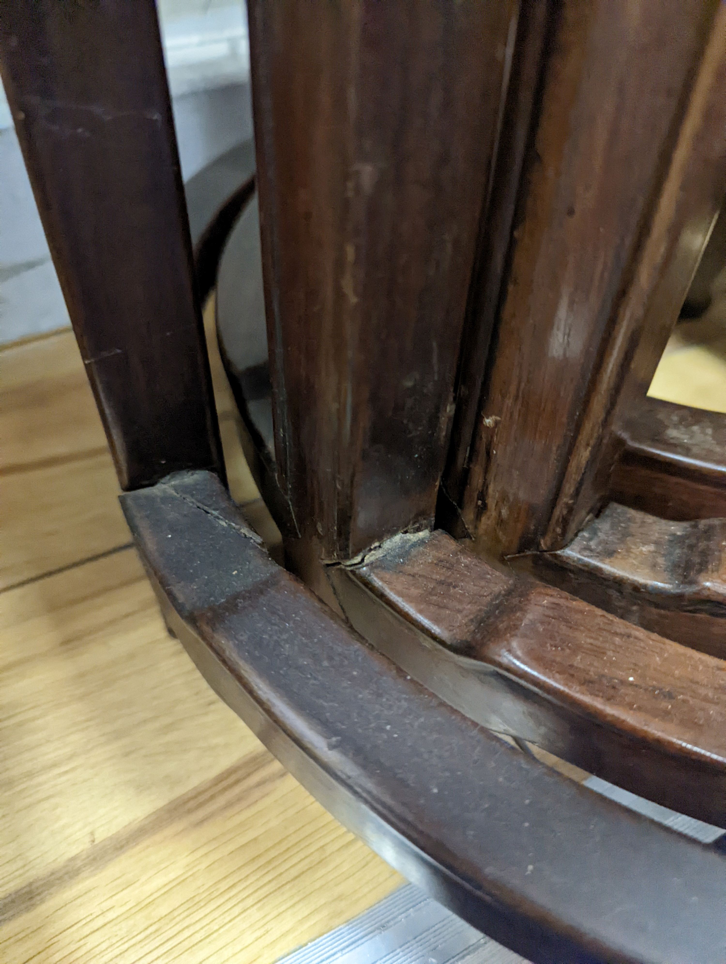 A nest of four Chinese hardwood circular tables, largest diameter 40cm, height 67cm